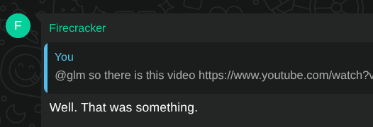 GLM reacting to a YouTube link dropped in chat with "Well. That was something."